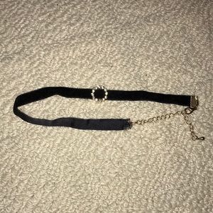 Black chocker w/ silver circle in the middle. NEW!